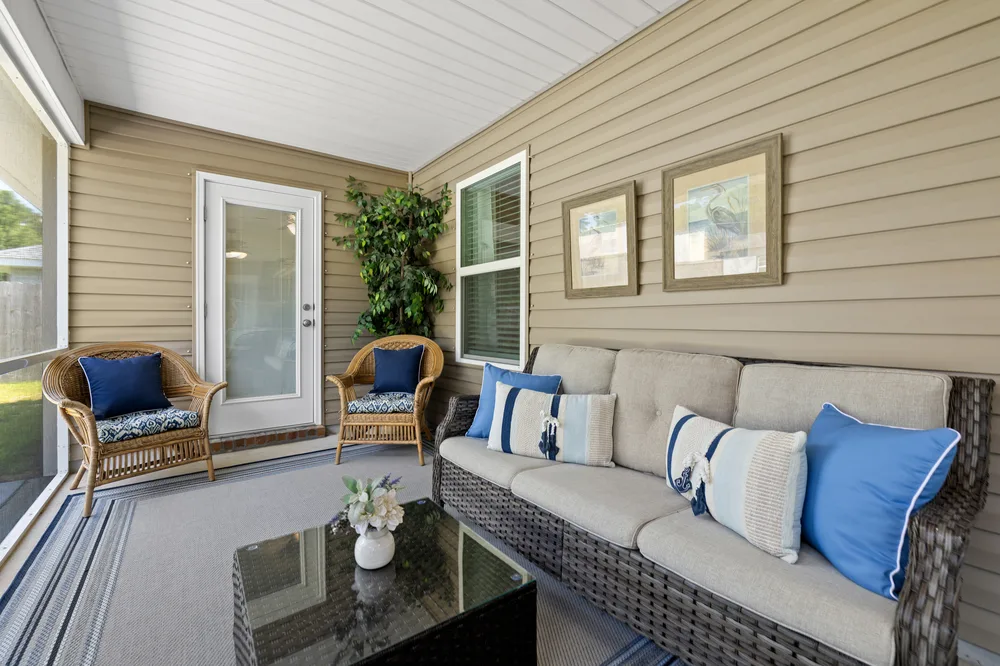 Screened porch styling by Joy Signature Designs